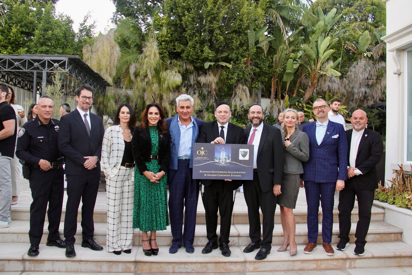 Rabbi Pini Dunner at the launch of the Orthodox Jewish Chamber of Commerce Western Region in Beverly Hills, with BHPD Chief Mark Stainbrook, Hungary Consul General István Gróf, Beverly Hills Vice Mayor Sharona Nazarian, and OJC CEO Duvi Honig
