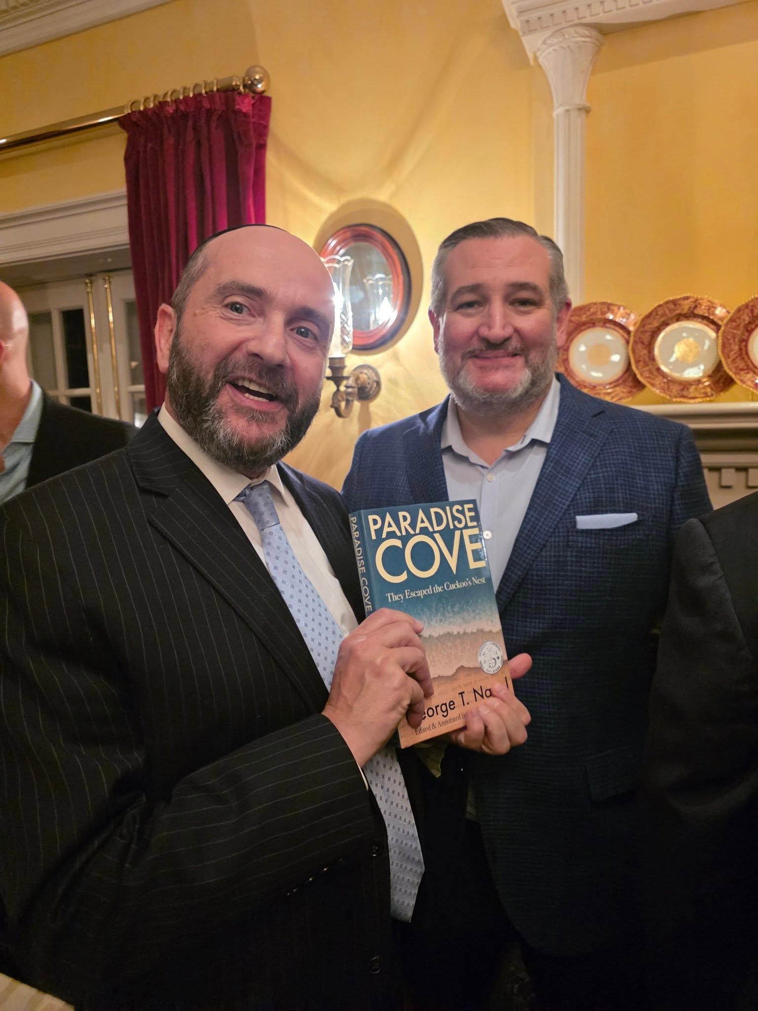 Rabbi Pini Dunner with U.S. Senator Ted Cruz, holding a copy of Paradise Cove: They Escaped the Cuckoo's Nest