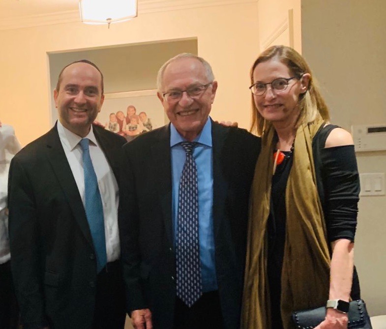 Rabbi Dunner with Alan and Carolyn Dershowitz during their visit to his home